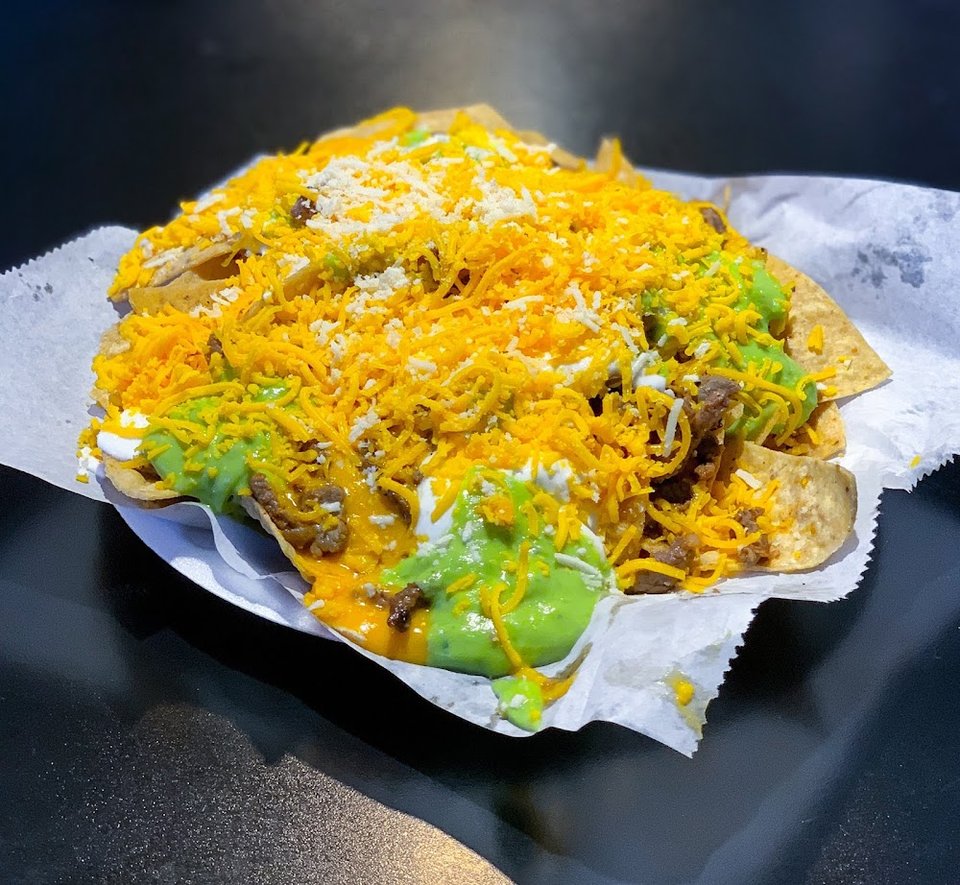 Mexican dishes listed on a simple menu.
