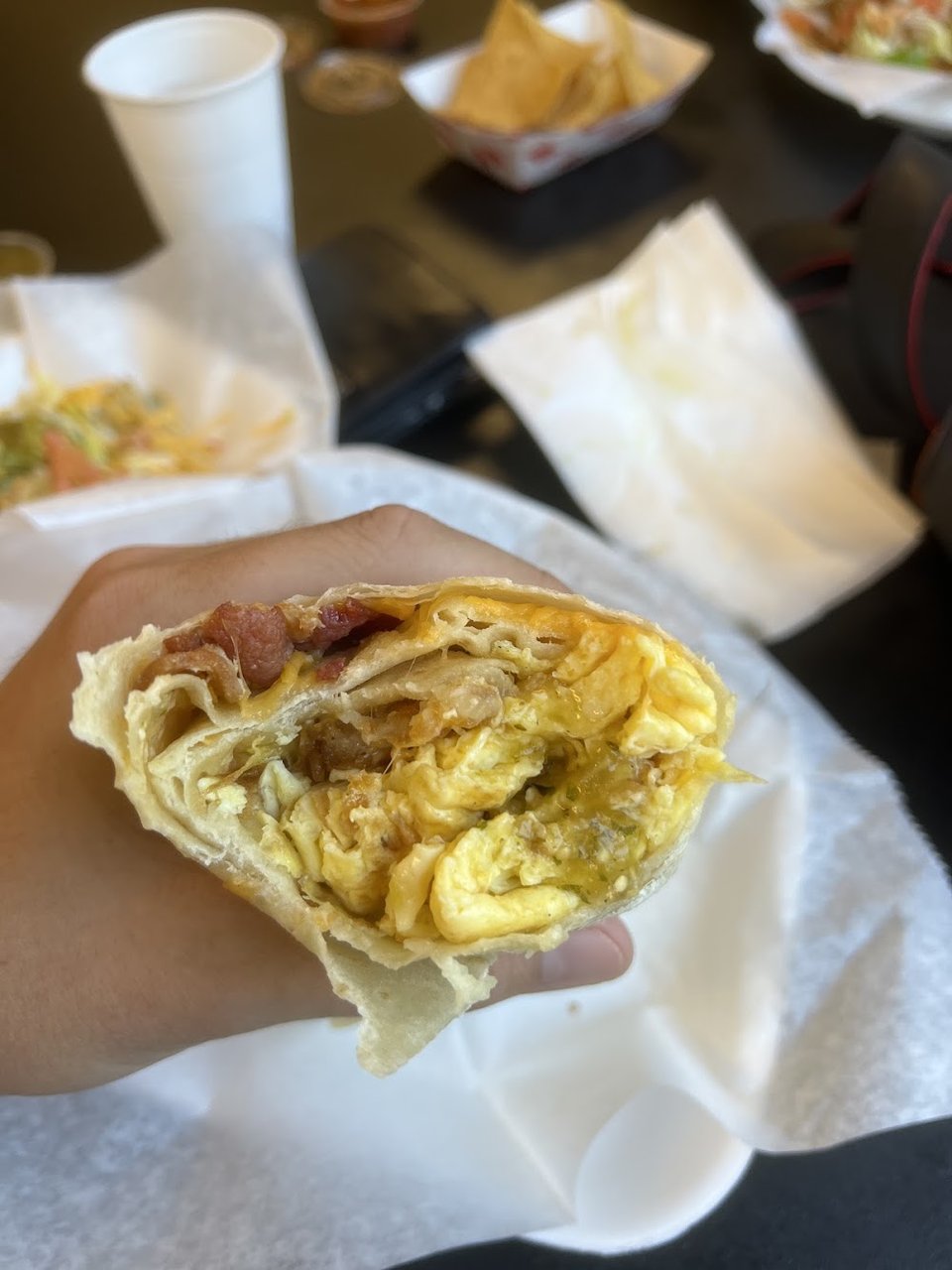 Menu page showing tacos and burritos.